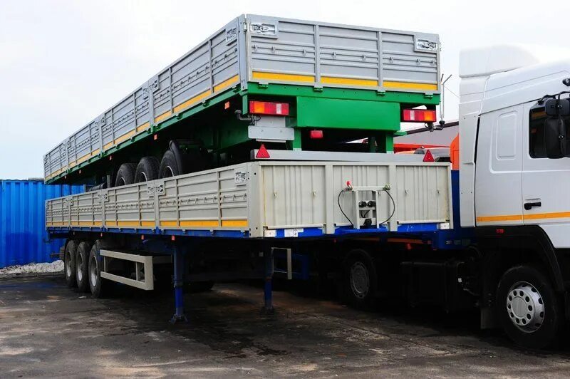 Прицеп маз 975800. Полуприцеп маз 975800. Полуприцеп 975800. Полуприцеп 975800. Полуприцеп бортовой маз 975800-2010.