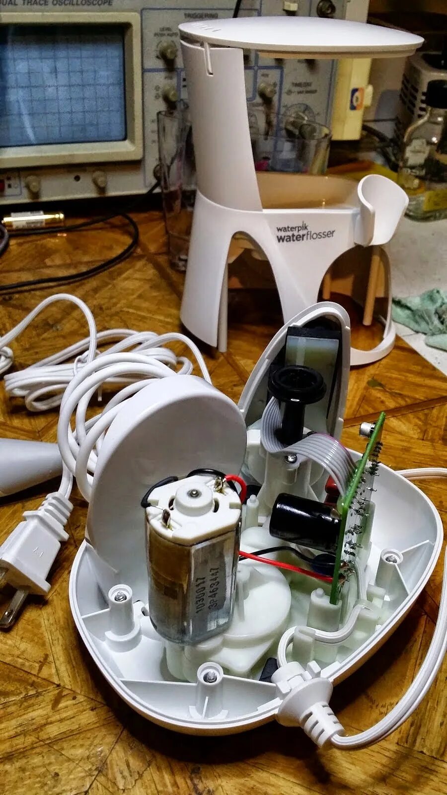 Как отремонтировать ирригатор. Помпа для ирригатора waterpik. запчасти для ирригатора waterpik. блок питания для ирригатора waterpik. разбор ручки ирригатора waterpik.