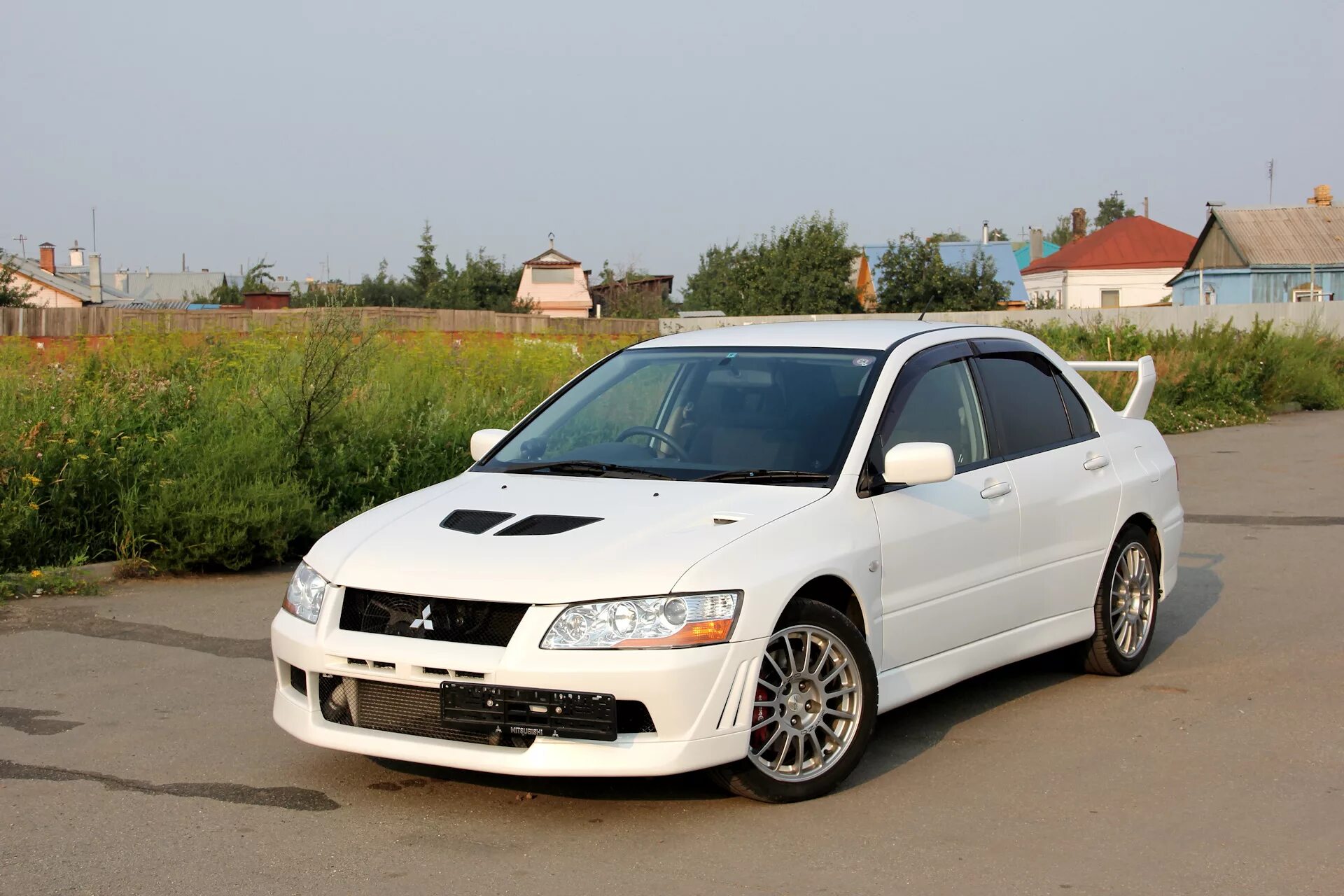 Эво под. Mitsubishi Lancer Evolution 2002. Mitsubishi Lancer Cedia Evolution. Mitsubishi EVO 2002. Mitsubishi Lancer (Lancer Evolution VII) 2.0 T EVO.