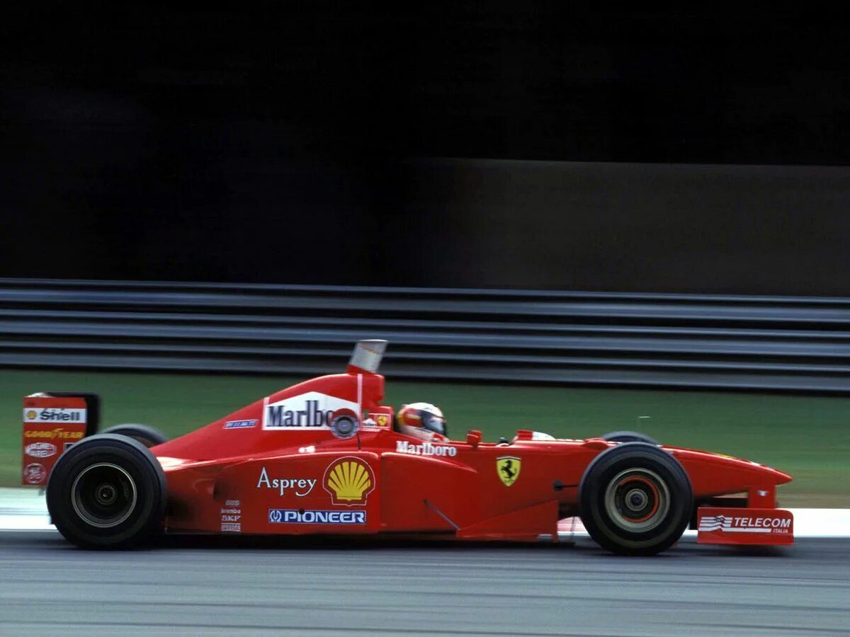 Сентони про. Ferrari f1 1997. Михаэль Шумахер Феррари. Михаэль Шумахер Ferrari f2004. Ferrari f310 Шумахер.