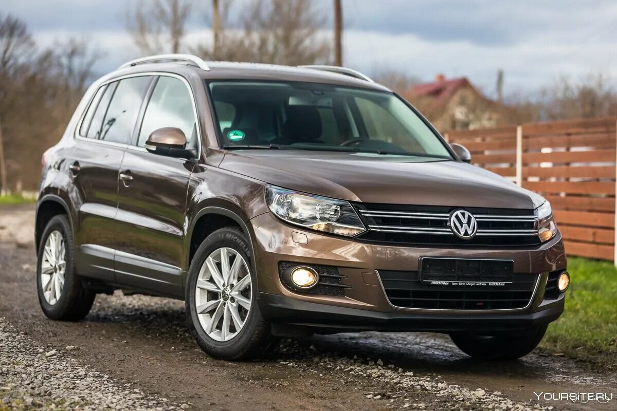 Купить фольксваген тигуан цены. Volkswagen Тигуан. Volkswagen Tiguan i. Tiguan Volkswagen Tiguan. Фольксваген Тиана.