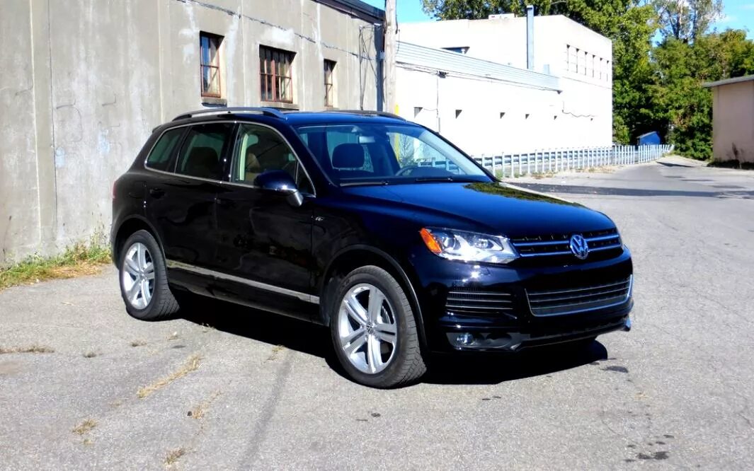 Volkswagen Touareg 1 поколение. Туарег 2. Volkswagen Touareg 2 поколение. Volkswagen Touareg 2014 черный.