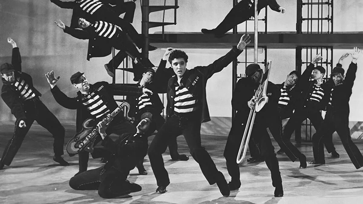 Гитара элвиса пресли. Jail rock house. Jail rock house. Элвис пресли танцует. Elvis presley 1957.