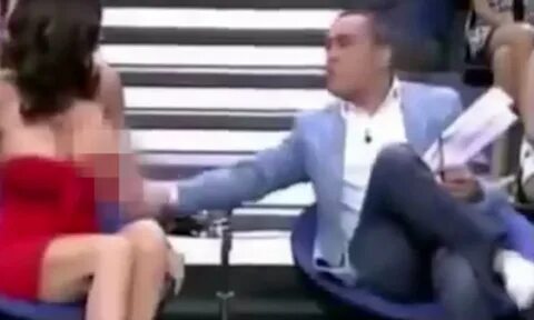 TV host in Spain pulls down dress of Yola Berrocal while cameras are rollin...