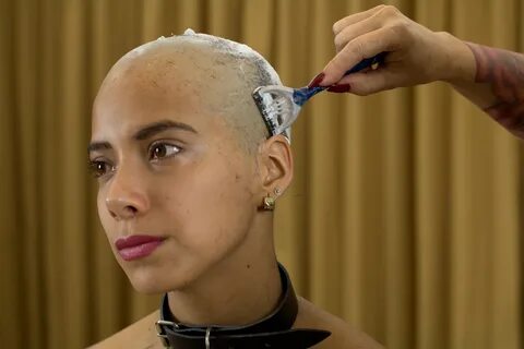 Forced headshave woman.