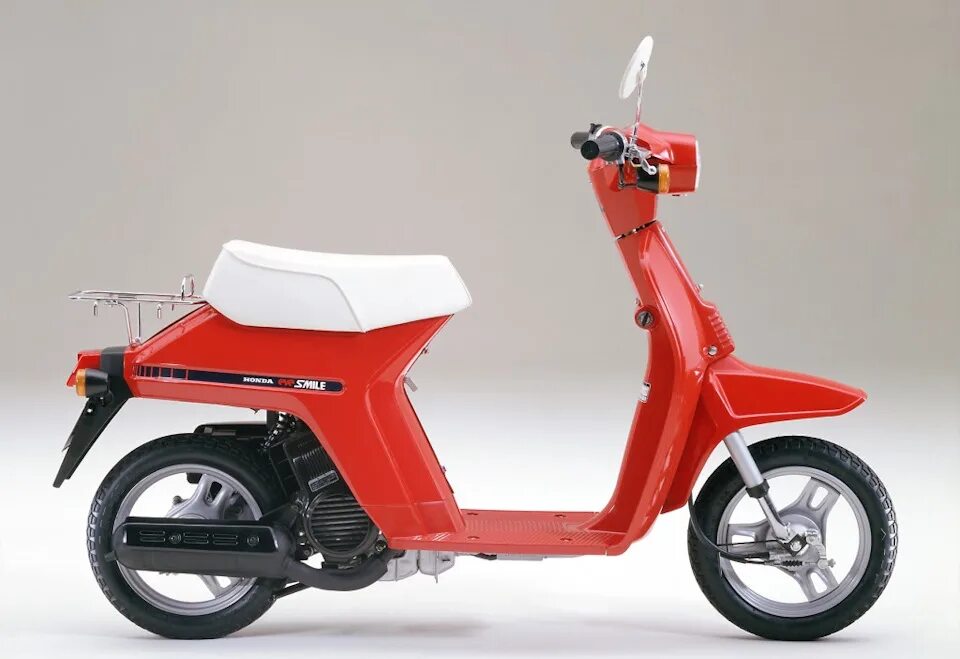 Honda eve 1990. Скутер honda eve smile. Хонда eve pax. Скутер honda eve smile. Honda tact ab07 1983.