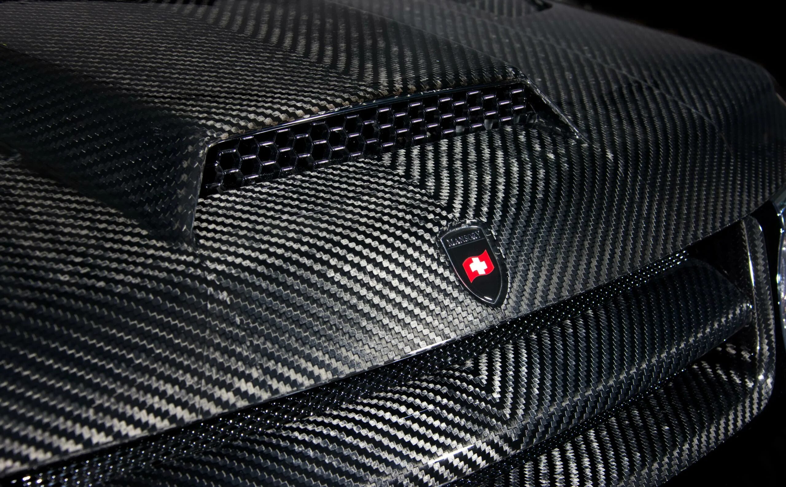 Вперед карбон. Кованый карбон mansory. мраморный карбон mansory. карбон кевларовая броня. range rover sport 2010 mansory.