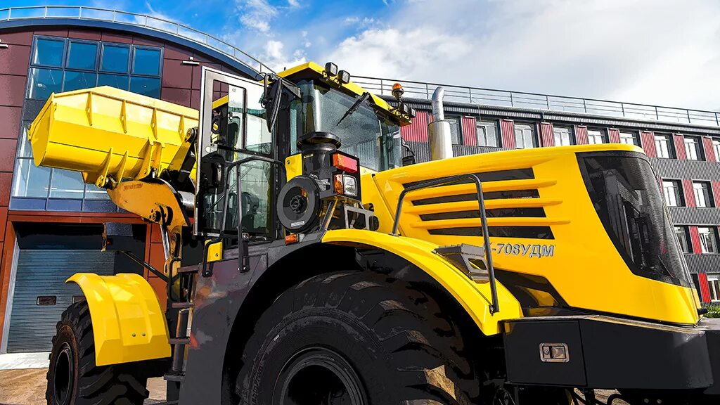 Кировец к 708 удм. Универсальная дорожная машина кировец к-708 удм. фронтальный погрузчик кировец к-708удм. погрузчик кировец к 708удм. трактор кировец к 708 удм.