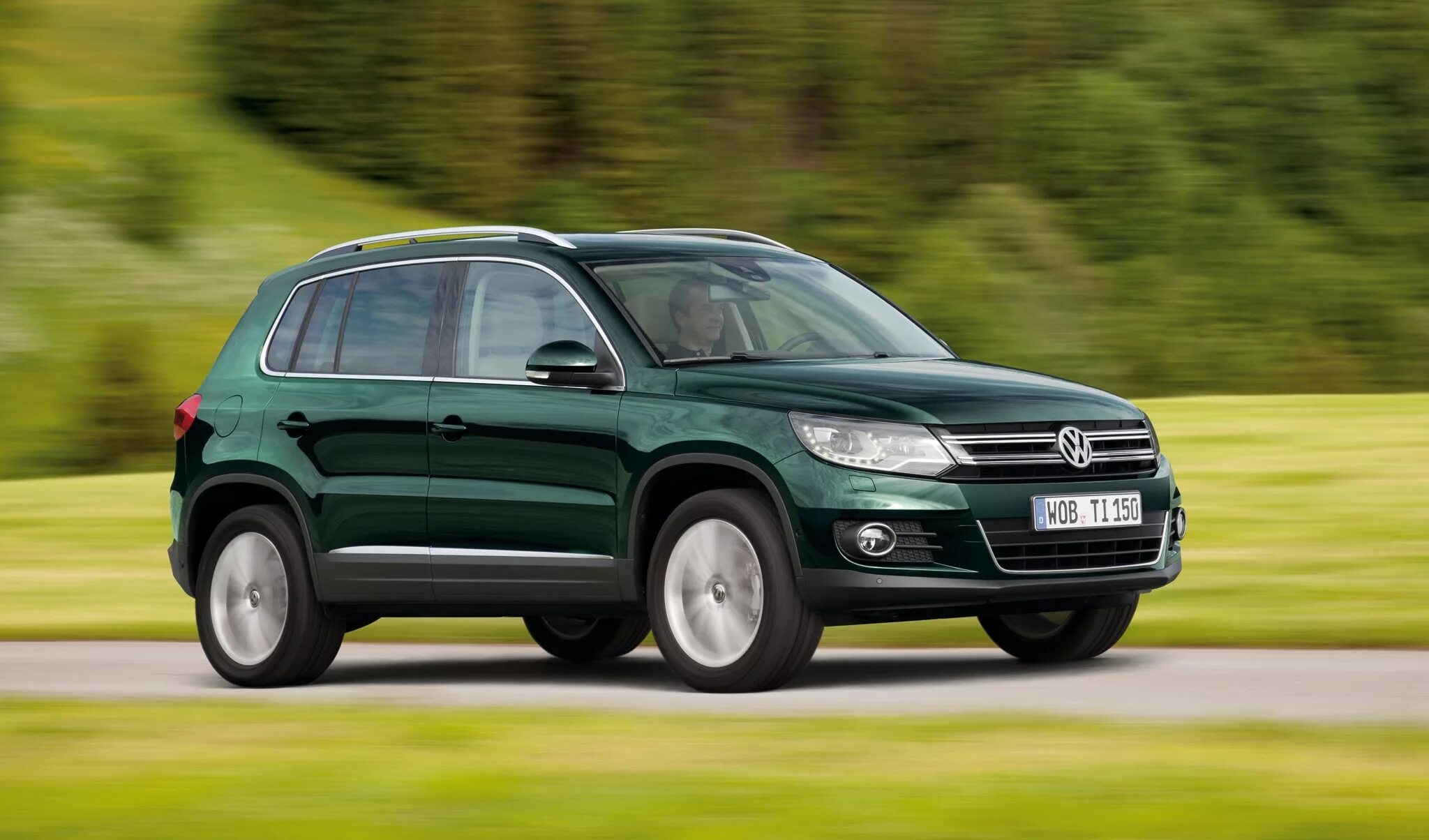 Характеристика автомобиль фольксваген. Volkswagen Tiguan зеленый. Tiguan 1. Фольксваген Тигуан 1. Фольксваген Тигуан 4.