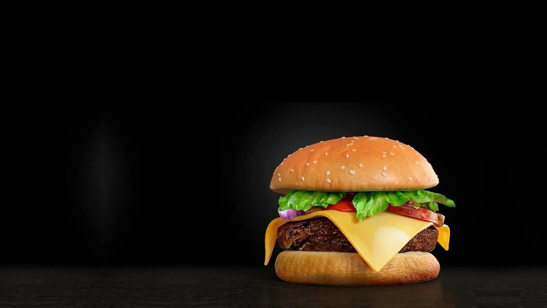 Чизбургер на черном фоне. Бургеры на черном фоне. Красивый бургер. Гамбургер на черном фоне.