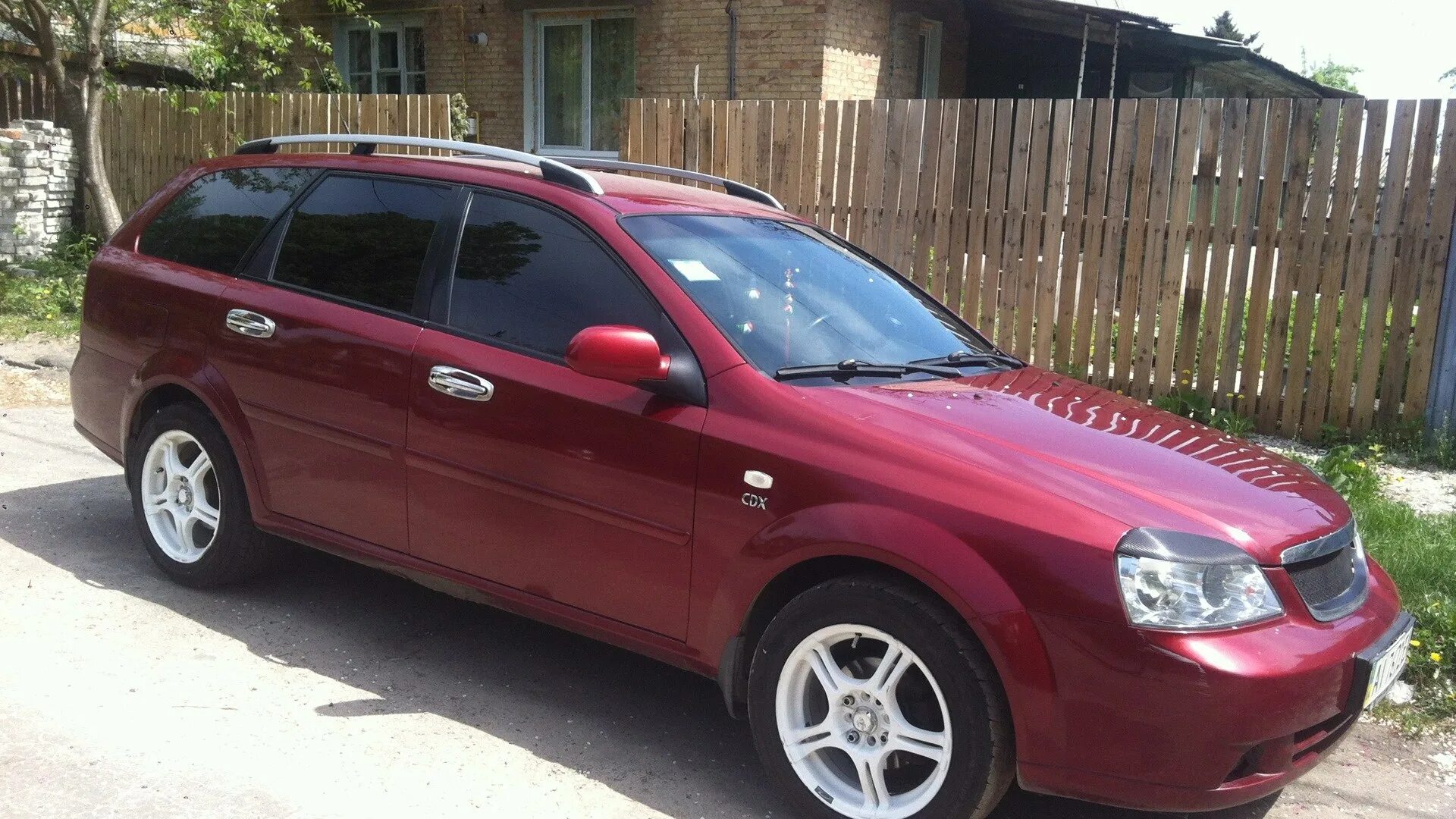 Chevrolet Lacetti SW. Шевроле Лачетти универсал красный. Шевроле Лачетти тёмно красного. Chevrolet Lacetti универсал Tuning. Шевроле универсал тюнинг