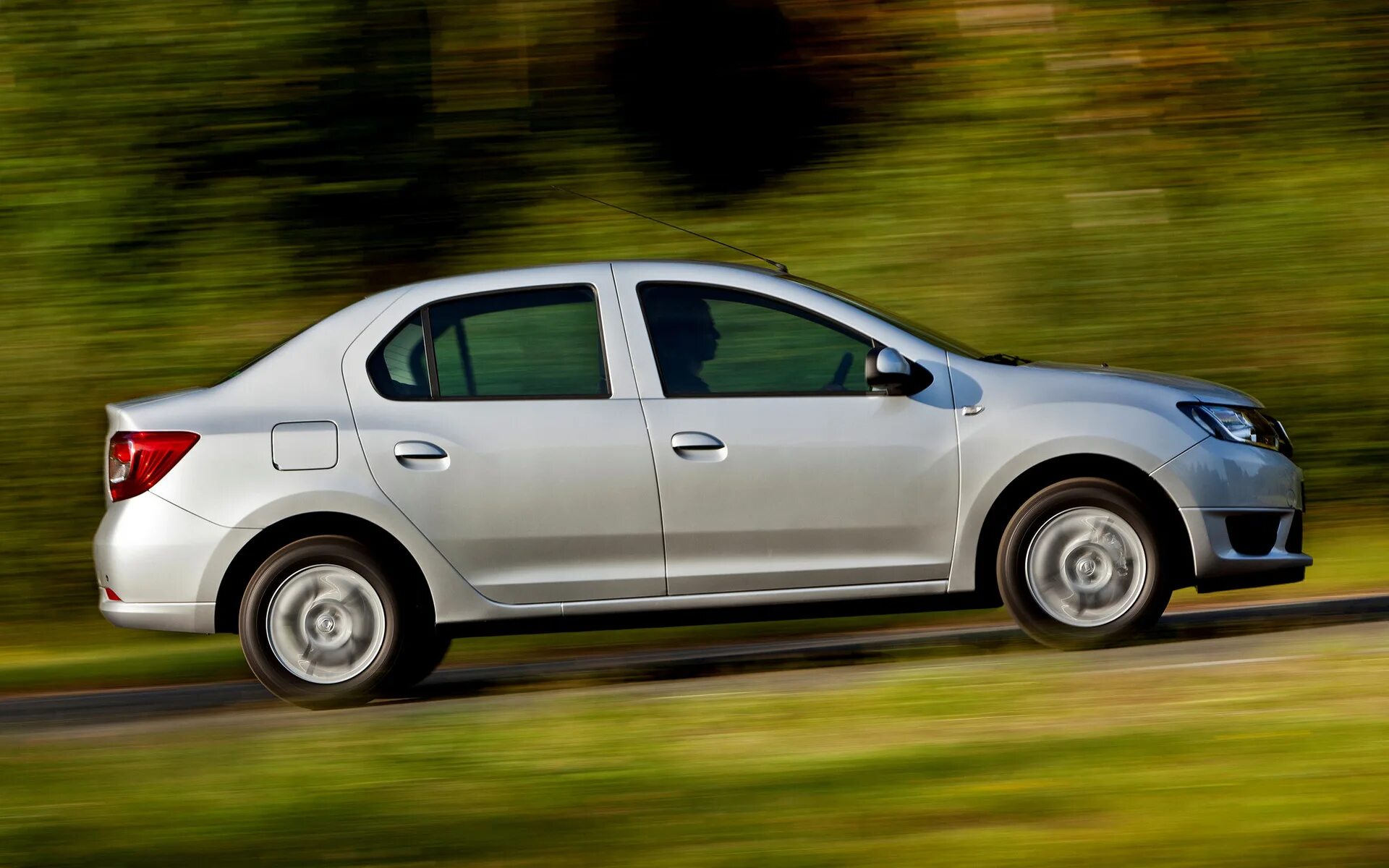 Рено логан сколько поколений. Рено Логан 2 2012. Renault Logan II 2013. Рено Логан 2 седан. Рено Логан Сандеро 1.