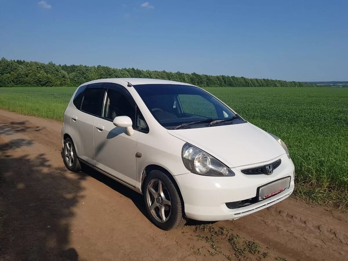 Купить хонда фит в новосибирске. Honda Fit 2003. Хонда фит 2003 года. Хонда фит 2003г. Honda Fit 2003 белый.