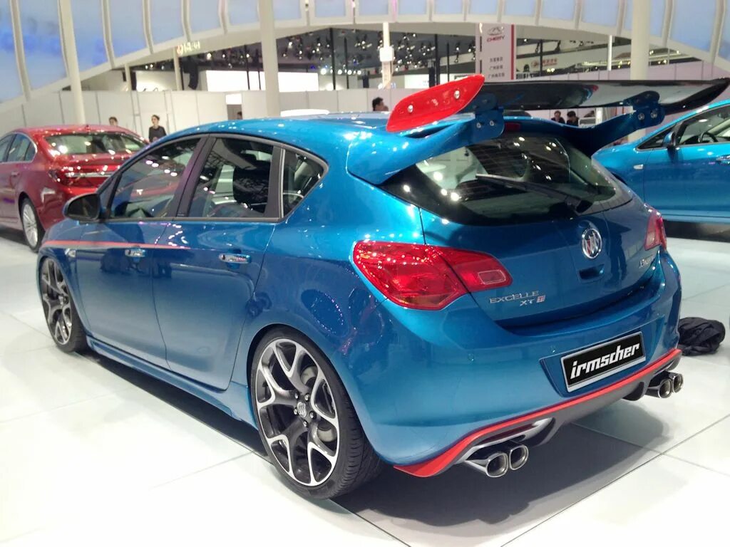 Тюнинг опель j. Astra j 5d OPC. Opel Astra j OPC Tuning. Astra j 5d синяя.