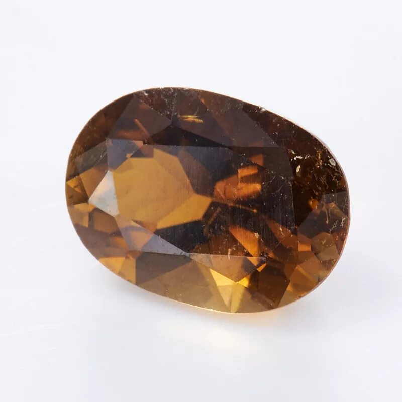 топаз камень коричневый. алмаз президент весом 79. коричневый полудрагоценный камень. коричневый сырец алмаз. циркон гиацинт камень.