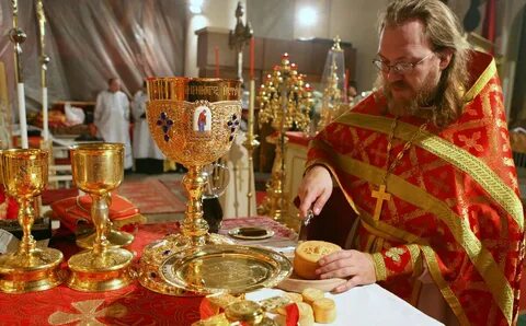Причастие батюшка