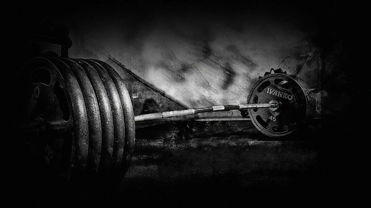 Мужчина со штангой. Дуэйн джонсон тренировки. Спортсмен в зале. Александр никулин бодибилдер. Качок в зале.