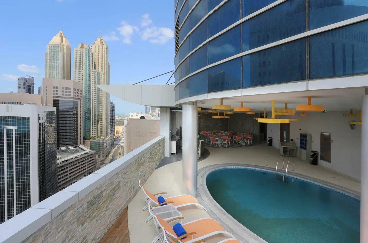 Tryp by wyndham barsha heights. Tryp by Wyndham Abu Dhabi City Center. Tryp by Wyndham Abu Dhabi City Centre 4*. Отель Дубай Tryp by Wyndham Dubai. Софитель Абу Даби Корниш.