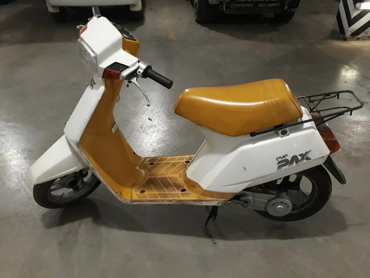 Скутер honda eve smile. Honda eve. Honda 50 lite. Хонда eve pax. Honda eve 1990.
