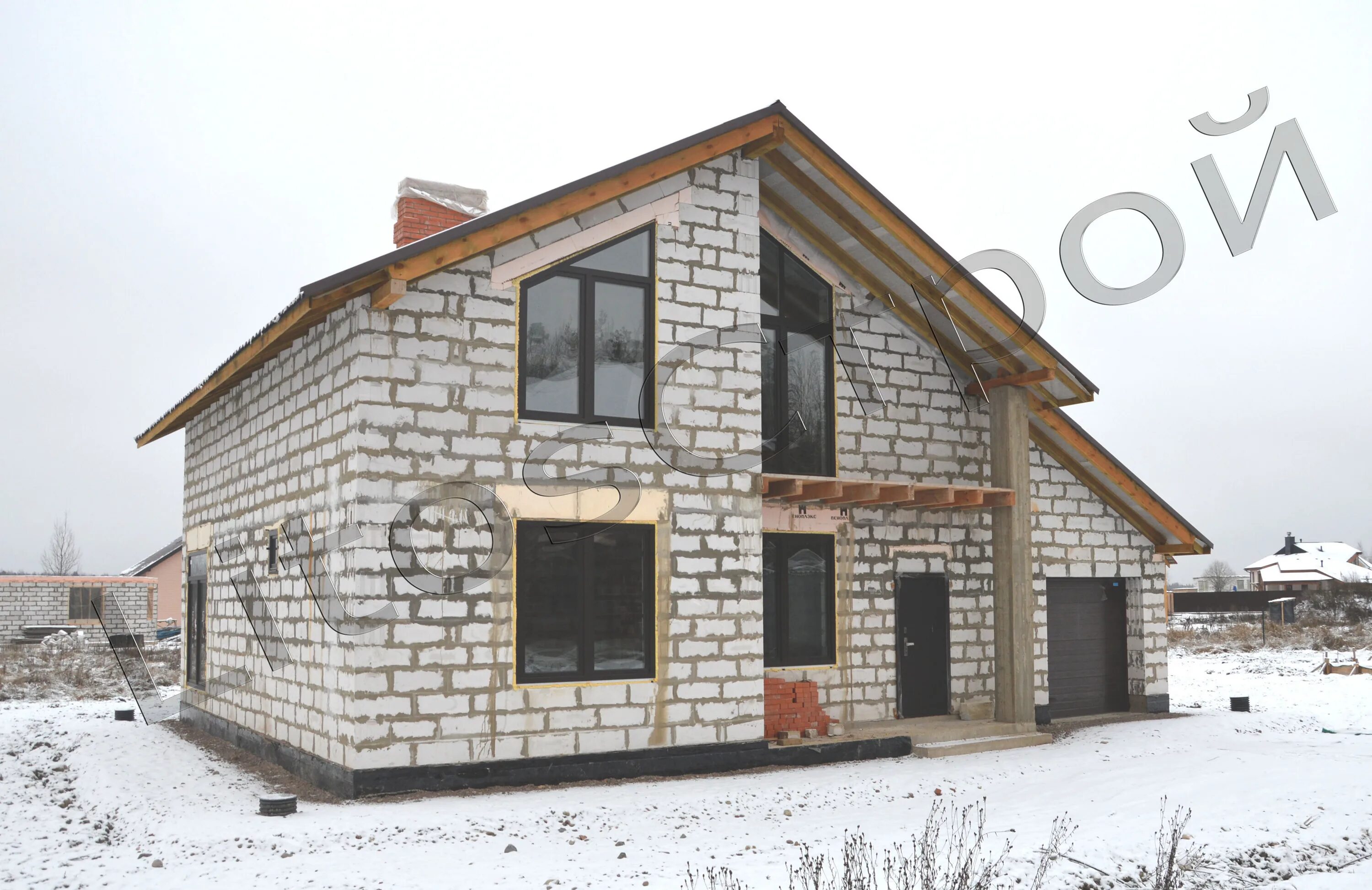 Проекты домов из газобетона. Гараж к дому из пеноблоков. Дом с мансардным этажом из газобетона. Дом из газобетона с гаражом. Дома из пеноблоков.