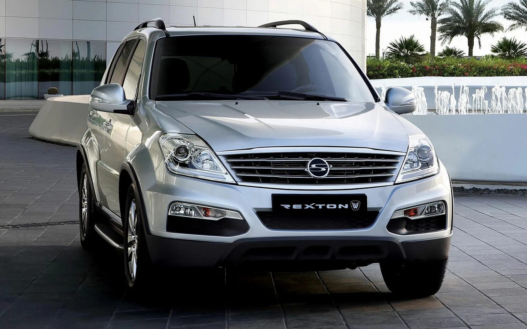 Саньенг корея. SSANGYONG Rexton 3. SSANGYONG Rexton 2013. Санг Йонг Рекстон 2013. SSANGYONG Rexton Рестайлинг 2012.