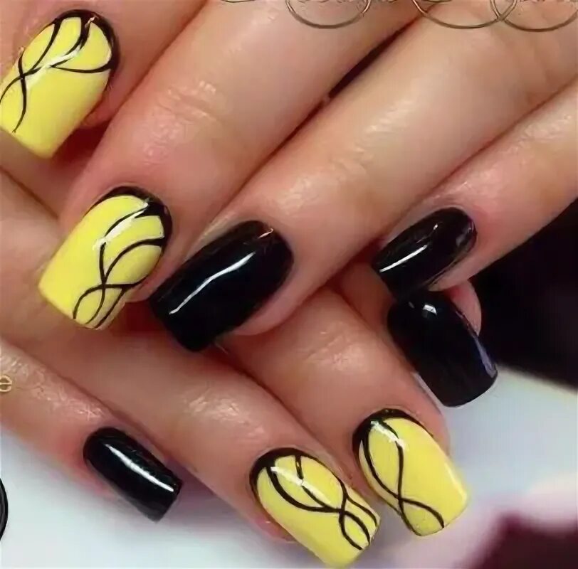 Amazing almond summer black and yellow acrylic nails with an accent grey nail #g