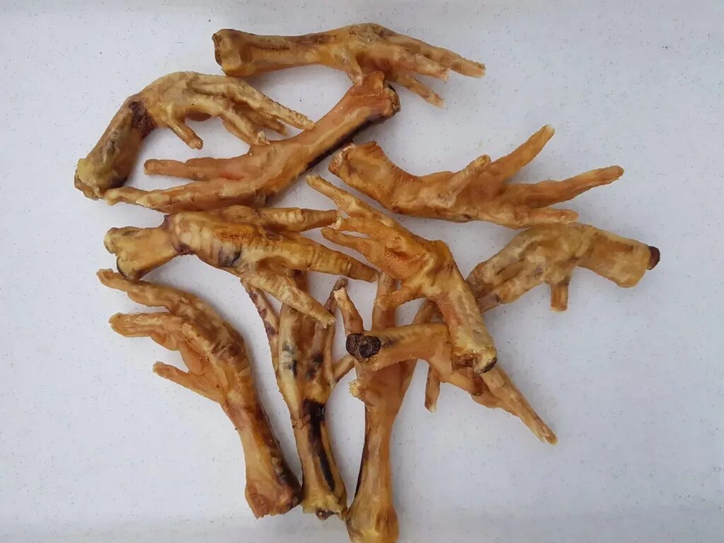 Можно щенку лапы куриные. Коллаген из куриных лапок. лакомство лапки куриные пм. куриные лапы источник коллагена.