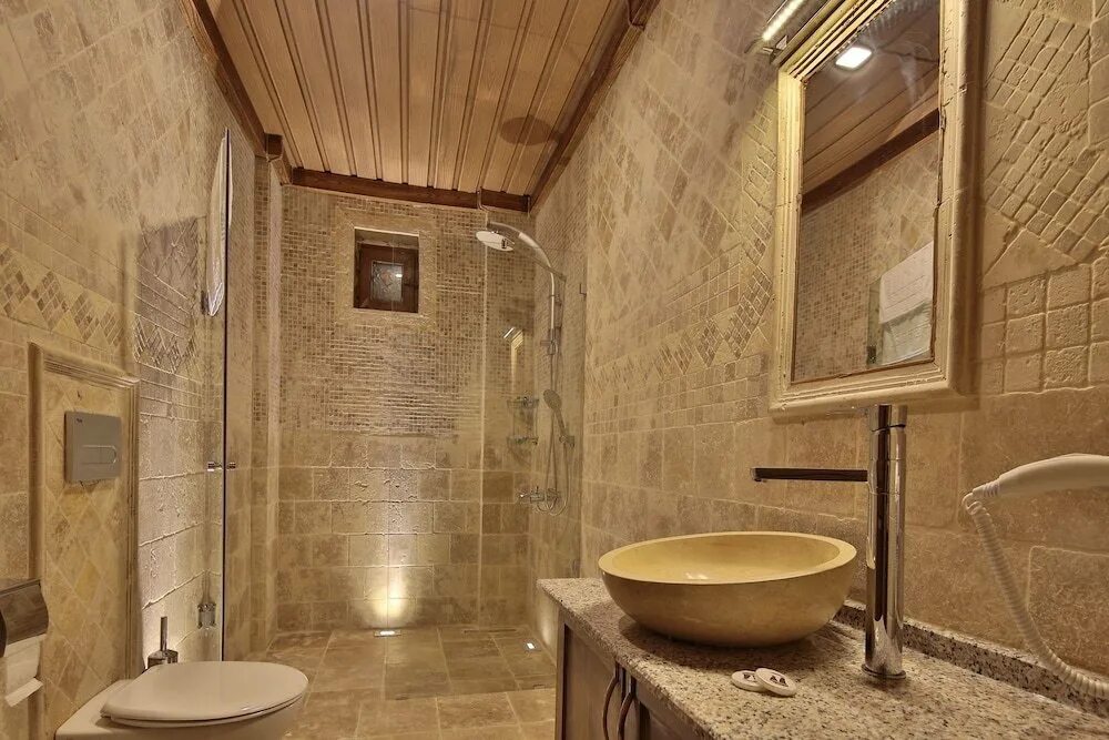 Elite stone. Элит Стоун. Cappadocia Elite Stone House. Элит Стоун Бретань темная. Cappadocia Elite Stone House фото отеля.