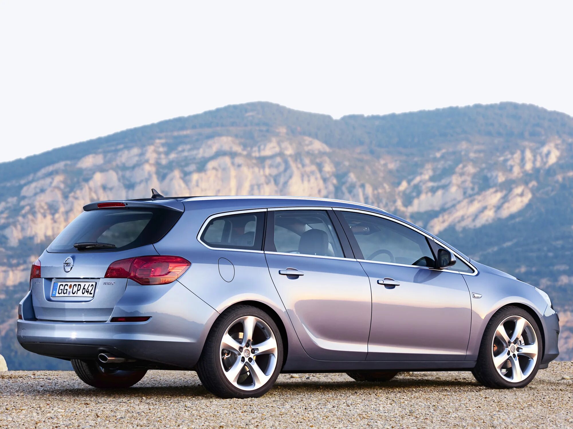 Opel astra j дизель. Opel astra sports tourer 2011. opel astra sports tourer (j) &#039;2010. опель астра j 2011 универсал. opel astra универсал 2011.