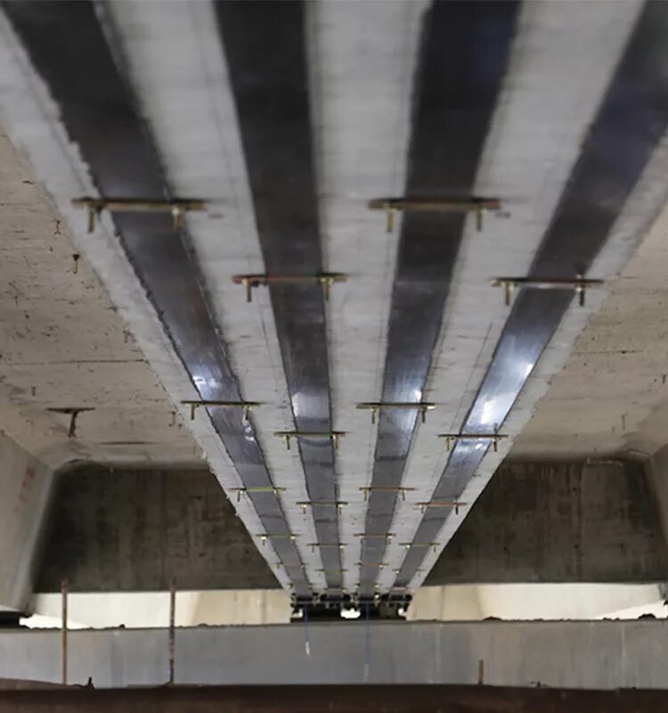 Композитное усиление. Carbon-fiber-reinforced polymer. ламели для усиления строительных конструкций. углеволокно для усиления конструкций. усиление перекрытий ламелями.