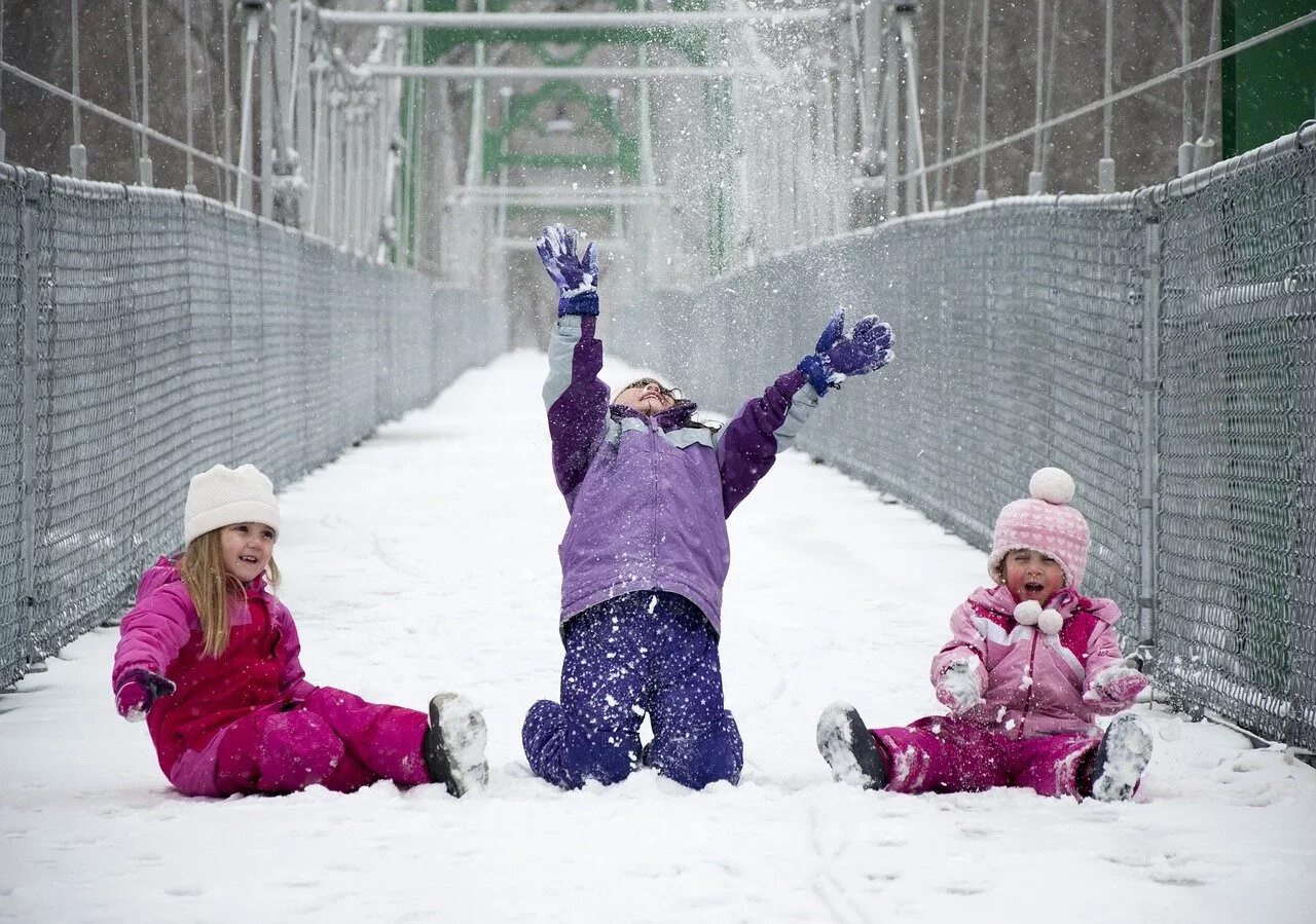 Child playing in the snow
