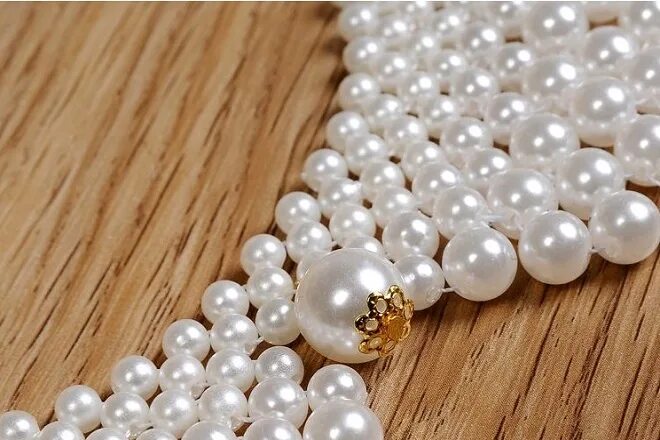 Как называется искусственный жемчуг. Морской культивированный жемчуг. Настоящий жемчуг. Настоящий жемчуг и искусственный. Жемчуг полубарокко.