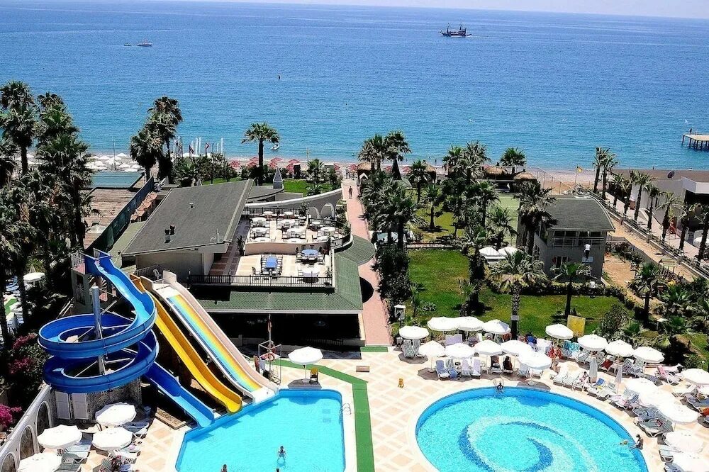 Holiday garden resort окурджалар. Holiday garden resort турция. Отель holiday garden resort hotel. Отель holiday garden resort hotel. Холидей гарден резорт 5 турция.