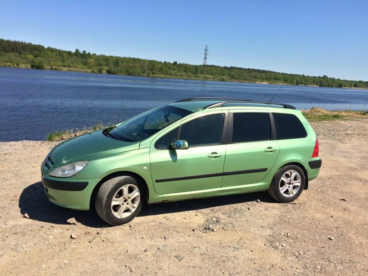 Peugeot 307 универсал. Пежо 307 универсал 2003. Пежо универсал 2002. 307 Св Пежо зеленый.