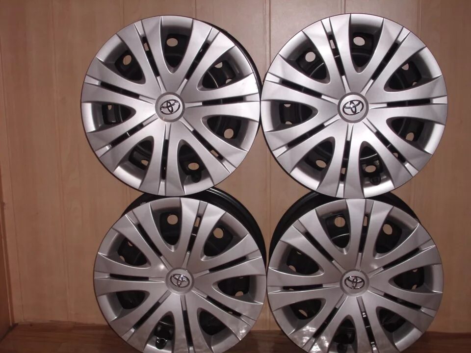 Диск колеса toyota corolla r16. Диски r16 королла. Диски r16 королла. Диск тойота королла r16 оригинал. Тойота королла 180 диски диски оригинал.