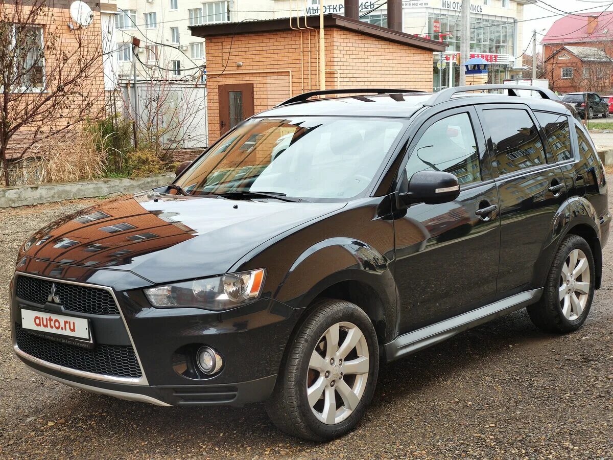 Mitsubishi Outlander 2 Рестайлинг. Mitsubishi Outlander 2010 черный. Митсубиси Аутлендер 2010 черный. Mitsubishi Outlander XL 2012 черный.