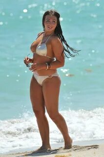 LAUREN GOODGER in Bikini at a Beach in Miami.