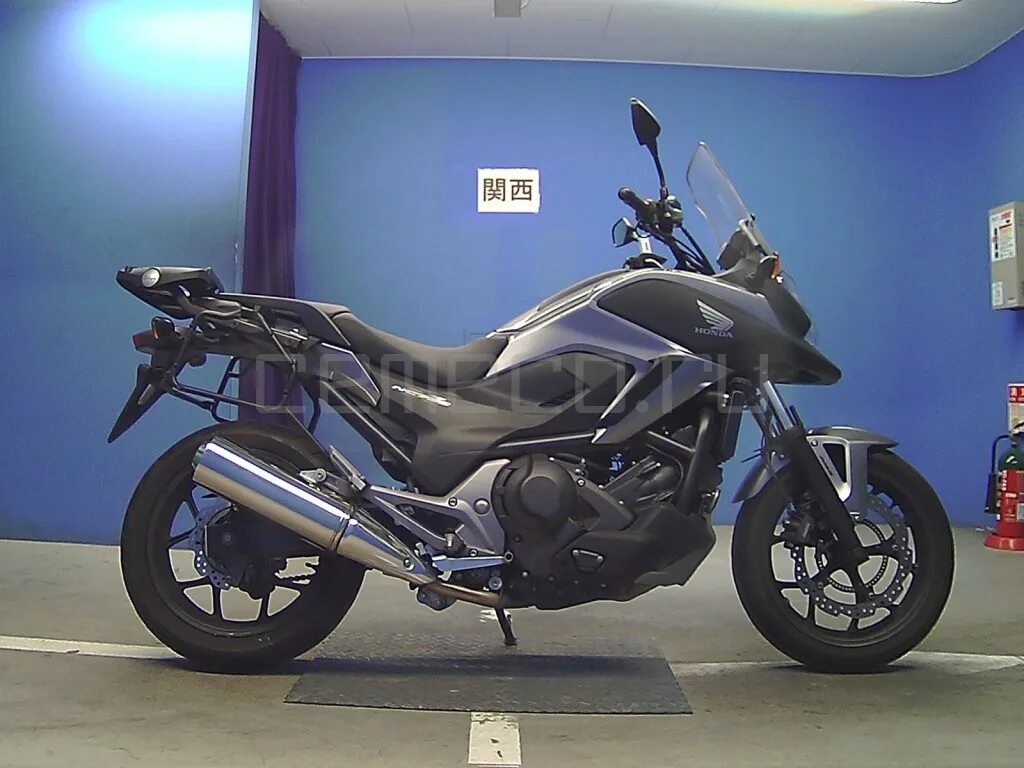 Мотоцикл 700 кубов. Honda nc750 2015. Honda nc750xa 2014. Хонда 700 кубов. Honda NS 750.