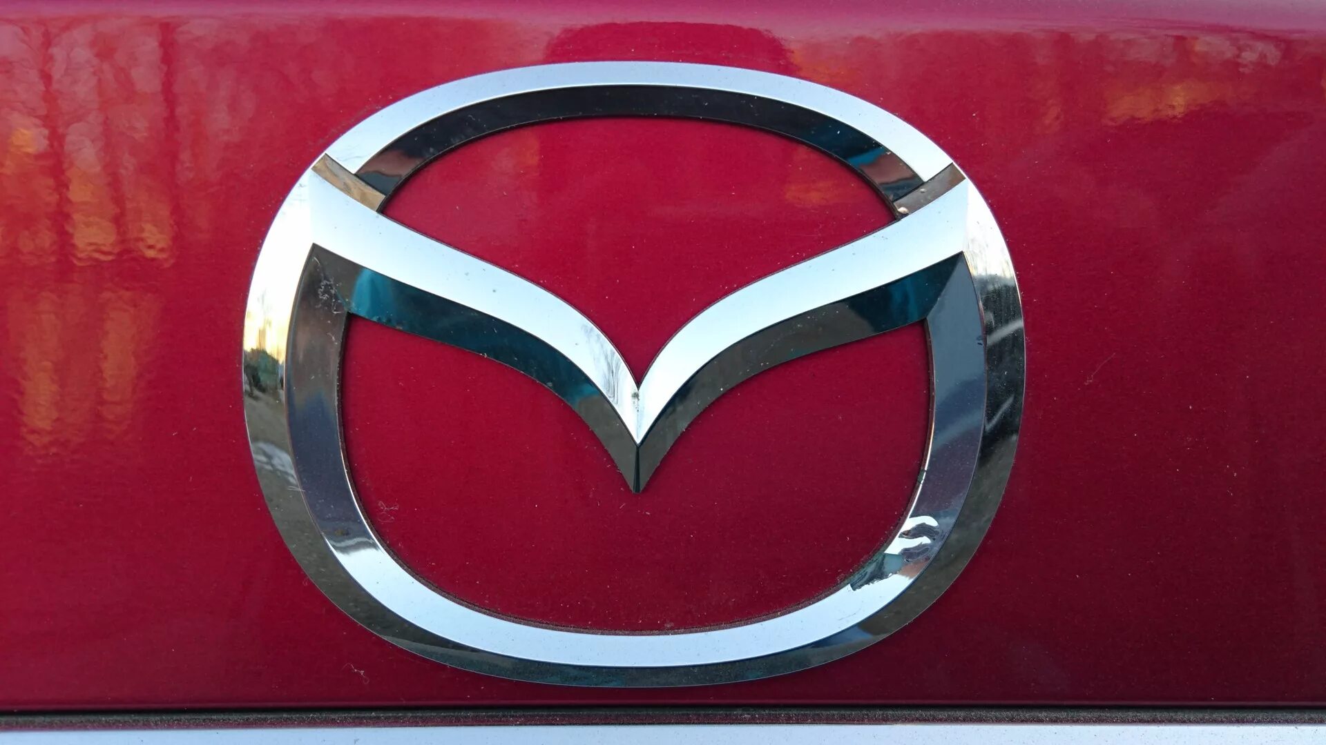 Mazda знак. Эмблема Мазда. Мазда символ. Mazda старый логотип. Мазда 6 значок.