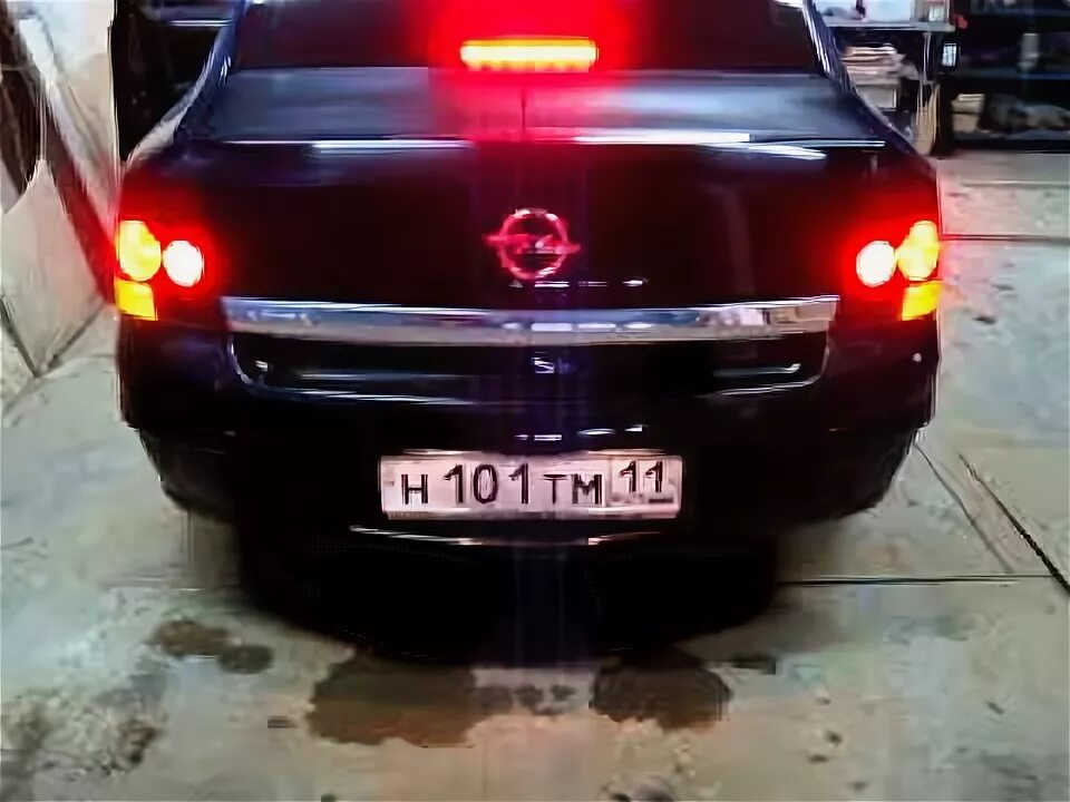 Самостоятельная замена лампы в заднем фонаре Opel Astra H. " Этюд на заданную те