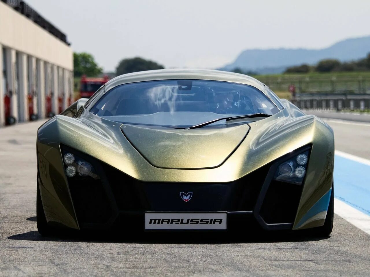 Автомобиль ну. Marussia b2. Marussia b2 2010. Спорткар Marussia b2.