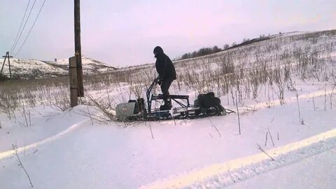 Мотособака по глубокому снегу
