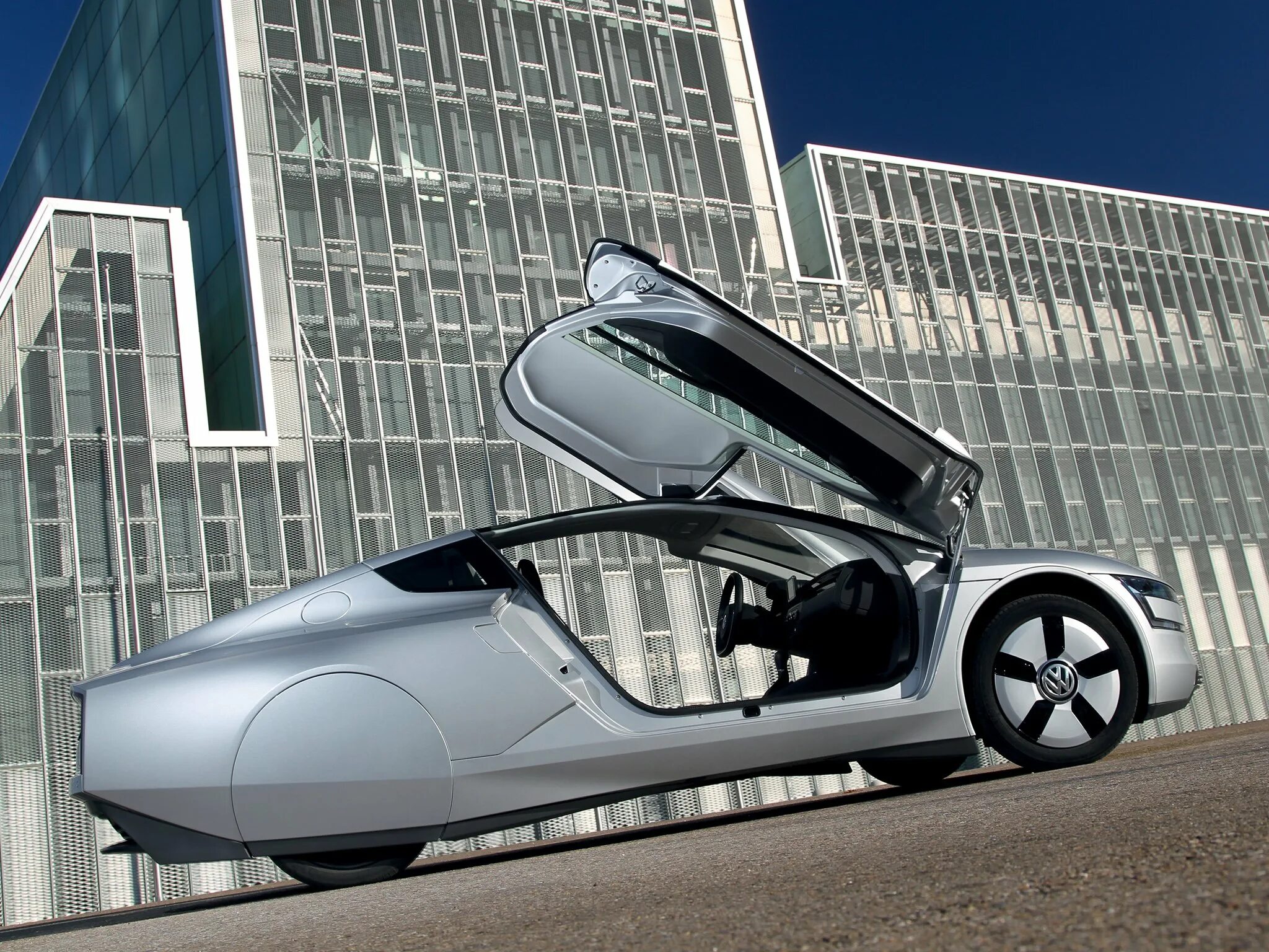 Какие автомобили самые качественные. Volkswagen xl1 (2013). Volkswagen Concept xl1. Volkswagen xl1 Interior. Рекордный Volkswagen xl1.