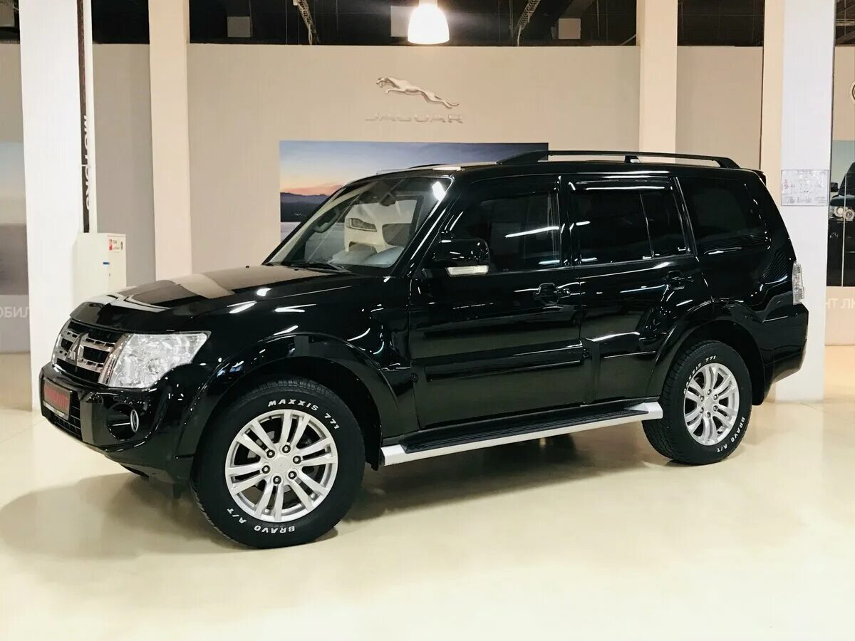 Pajero черный. Митсубиси Паджеро 4 черный. Mitsubishi Pajero IV Рестайлинг 1 ,2013. Pajero 4 черный. Мицубиси Паджеро 2013 года.