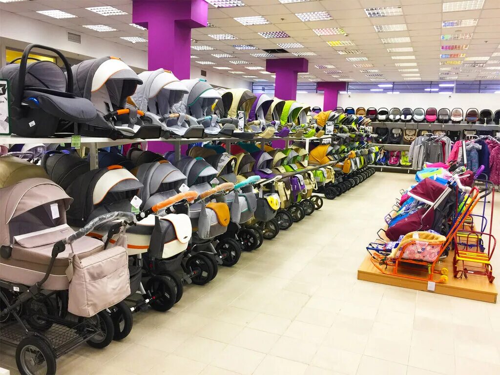 магазин колясок. магазин детских колясок в спб. магазин склад колясок. детские коляски в магазине. компасик магазин колясок в спб.