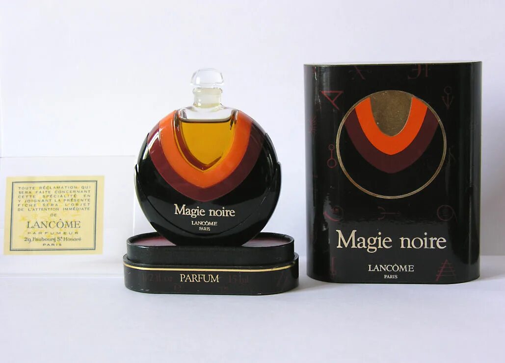 Magie noire lancome винтаж духи. Lancome magie noire 50 мл. Духи ланком черные. Lancome magie noire. Духи ланком черные.