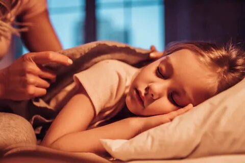 Child sharing bed