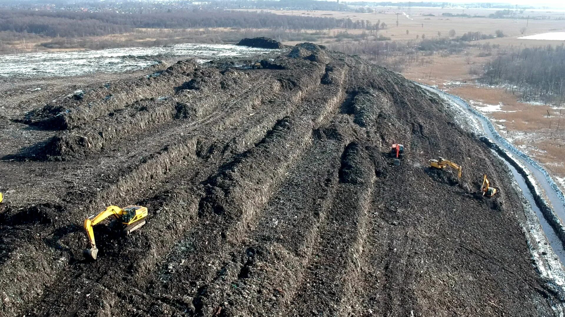 вывоз грунта. полигон тбо игумново. котлованный грунт. ликвидация карьеров биологический этап. полигон утилизация грунта.