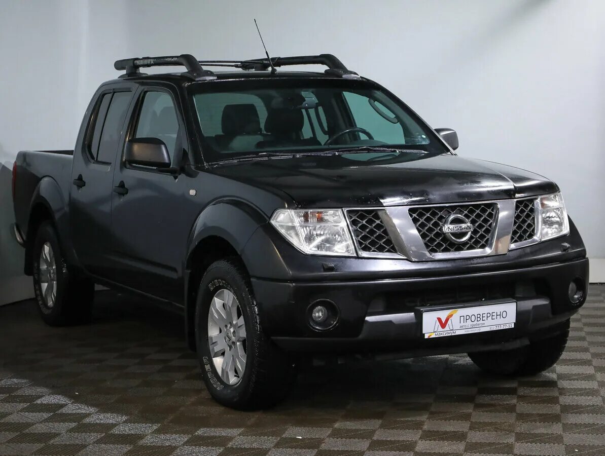 Купить ниссан навара бу. Nissan Navara (Frontier) III (d40). Nissan Navara d40. Nissan Navara 2006. Nissan Navara чёрный.