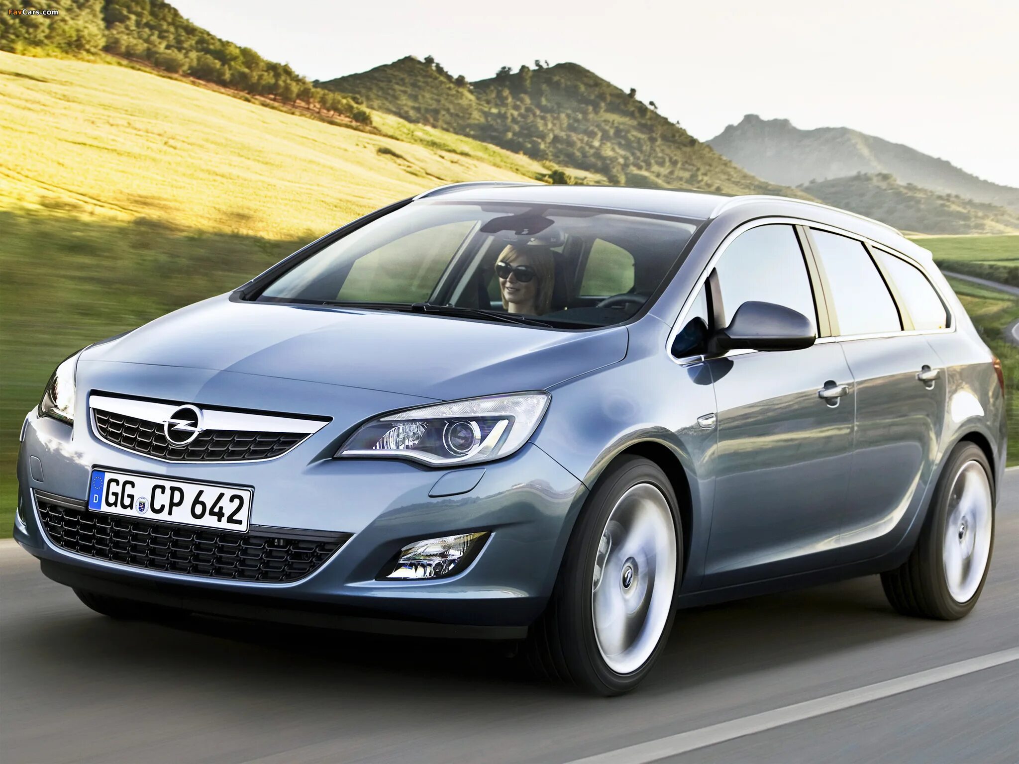 Купить опель гродно. Opel Astra 2011. Opel Astra Sports Tourer 2012.